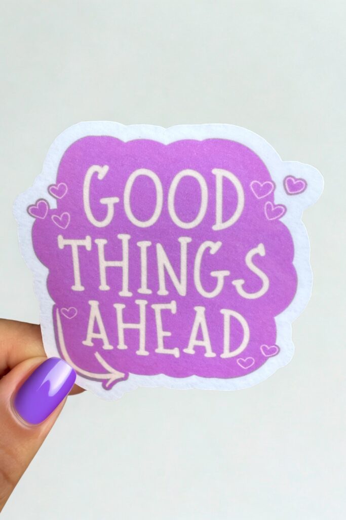 Purple sticker with white text reading “Good Things Ahead,” surrounded by small heart illustrations—offering a hopeful, uplifting message for emotional wellness and positivity.