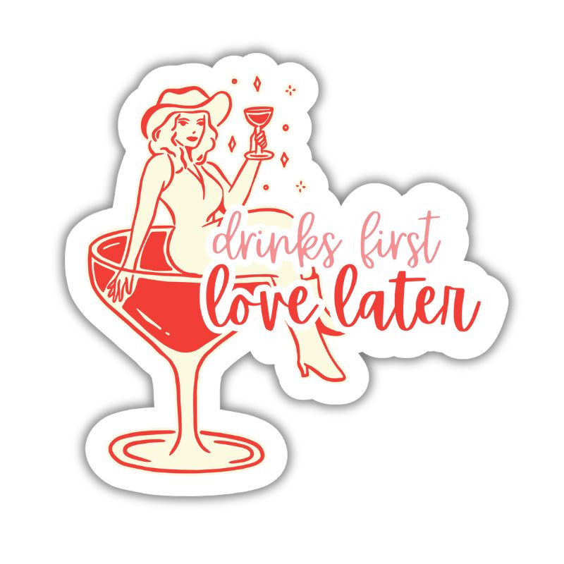 Retro‑style illustration of a woman lounging inside a cocktail glass with the phrase “drinks first love later,” in a bold, feminine cocktail‑themed design.